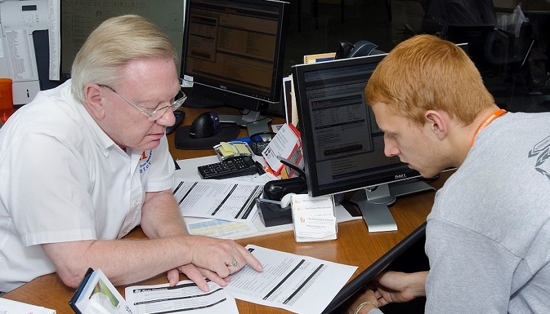 Dr. Fleming with a student jpg